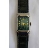 GENTLEMAN'S BULOVA WRISTWATCH the green dial with Arabic numerals at 3, 9 and 12,