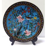 CHINESE CLOISONNE CHARGER with a black and floral border encasing a Royal blue ground decorated