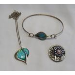 MALCOLM GRAY FOR ORTAK ENAMEL SET SILVER PENDANT AND MATCHING BANGLE each of stylised leaf design