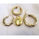 THREE SINGLE NINE CARAT GOLD HOOP EARRINGS of various sizes and designs;