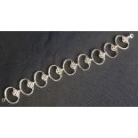 ART NOUVEAU STYLE SILVER BRACELET each of the links with motif decoration, 19.