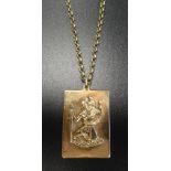 NINE CARAT GOLD SAINT CHRISTOPHER MEDAL 3.8cm x 2.7cm, with loop suspension, approximately 17.