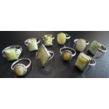 TEN SILVER RINGS all set with marble and some with marcasite