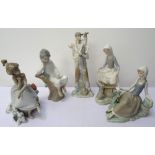 FIVE LLADRO FIGURES a young man carrying a goat round his neck, 27.