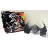 TWO STAR WARS TIE FIGHTERS comprising a vintage Darth Vader Tie Fighter; and a boxed Tie Fighter,