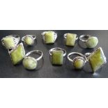 TEN SILVER RINGS all set with green marble and some with marcasite