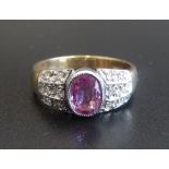 PINK TOPAZ AND DIAMOND DRESS RING the central oval cut pink topaz approximately 0.