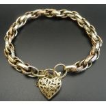 THREE TONE NINE CARAT GOLD FANCY BELCHER LINK BRACELET each of the links with raised decoration,