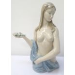 NAO/LLADRO FEMALE NUDE 'BEAUTIFUL BATHER' holding a rose in one hand, printed,