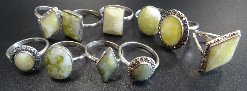 TEN SILVER RINGS all set with green marble and some with marcasite