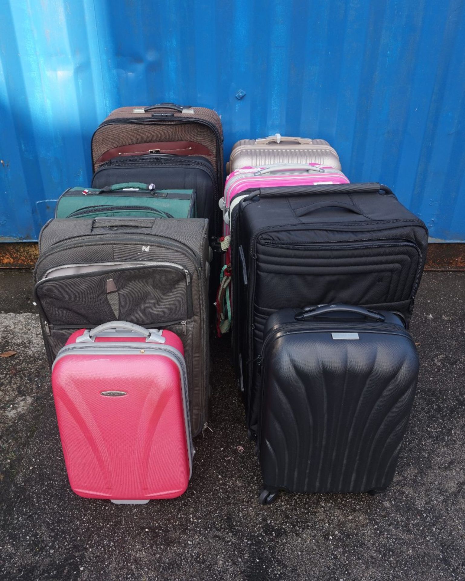 SELECTION OF TEN SUITCASES