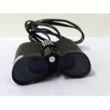 PAIR OF NIKON FIELD GLASSES with a textured grip body, 7x21 magnification,