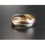 NINE CARAT GOLD RUSSIAN WEDDING RING the three interlocking bands in yellow, white and rose gold,