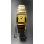 LADIES RADO DIASTAR GOLD PLATED WRISTWATCH the rectangular dial with button markers,