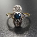 ART DECO STYLE PLAQUE DESIGN BLUE TOPAZ AND DIAMOND RING the central blue topaz in multi diamond