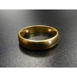 TWENTY-TWO CARAT GOLD WEDDING BAND with internal sizing beads, ring size O, approximately 7.