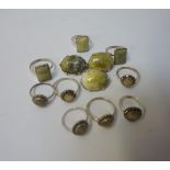 TEN SILVER RINGS all set with green marble and some with marcasite
