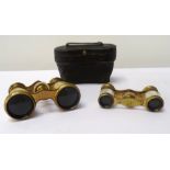 PAIR OF EDWARDIAN MOTHER OF PEARL AND BRASS FRAMED OPERA GLASSES with leather case,