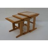 NEST OF THREE OAK TILE-TOP TABLES