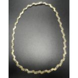 ATTRACTIVE FOURTEEN CARAT GOLD NECKLACE