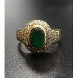 EMERALD AND DIAMOND CLUSTER DRESS RING