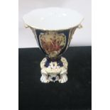 A GERMAN GLAZED PORCELAIN CENTREPIECE,