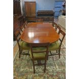 A FINE SHERATON STYLE MAHOGANY AND SATINWOOD INLAID ELEVEN PIECE DINING ROOM SUITE comprising ten