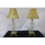 A PAIR OF CUT GLASS AND GILT BRASS MOUNTED VICTORIAN STYLE TABLE LAMPS,