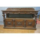 A FINE 19th CENTURY OAK CARVED BUFFET,