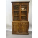 A VICTORIAN WALNUT DISPLAY CABINET,