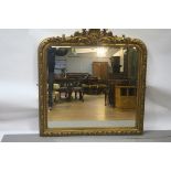 A CONTINENTAL GILT FRAME OVERMANTLE MIRROR,