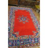 A RECTANGULAR WOOL RUG,