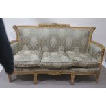 A CONTINENTAL GILT WOOD AND PAINTED SOFA,