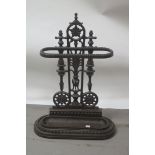 A VICTORIAN STYLE CAST IRON BROWN PAINTED STICK STAND,