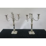 A PAIR OF GEORGIAN STYLE SILVER PLATED THREE BRANCH CANDELBRAM,