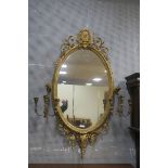 A VICTORIAN GILTWOOD AND GESSO GIRANDOLE MIRROR,