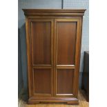 A CHERRYWOOD TWO DOOR WARDROBE,