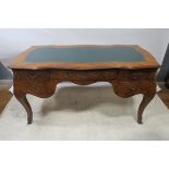 A CONTINENTAL KINGWOOD WRITING TABLE,