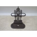 A VICTORIAN STYLE CAST IRON BROWN PAINTED STICK STAND,