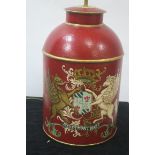 A PAIR OF METAL AND POLYCHROME TABLE LAMPS, each of cylindrical form, painted with coat of arms,