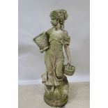 A COMPOSITION STONE GARDEN FIGURE,