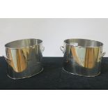 A PAIR OF PLATED ICE BUCKETS,