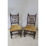 A PAIR OF AESTHETIC STYLE SIDE CHAIRS,