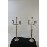 A PAIR OF CHROME FOUR BRANCH CANDELABRA,