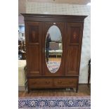 AN EDWARDIAN MAHOGANY AND SATINWOOD INLAID WARDROBE,