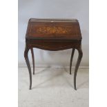 A CONTINENTAL ROSEWOOD AND MARQUETRY INLAID BUREAU DE DAME,