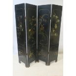 AN ORIENTAL FOUR FOLD EBONISED ROOM SCREEN,