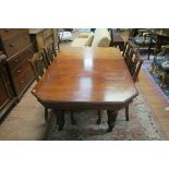 A VICTORIAN MAHOGANY DINING ROOM TABLE, the rectangular top with moulded rim on canted corners,