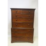 A GEORGIAN MAHOGANY CHEST ON CHEST, with two short and three long graduated drawers,