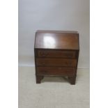 A LATE 19th CENTURY MAHOGANY AND MARQUETRY INLAID BUREAU,